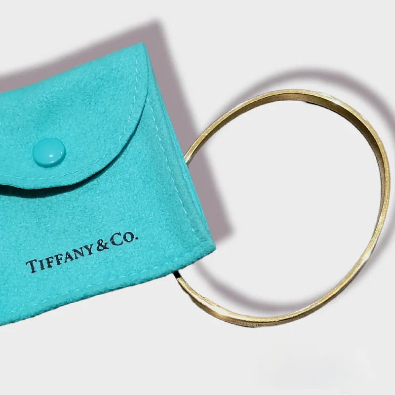 TIFFANY & CO - Oval Polished 18K Gold Flat Bangle